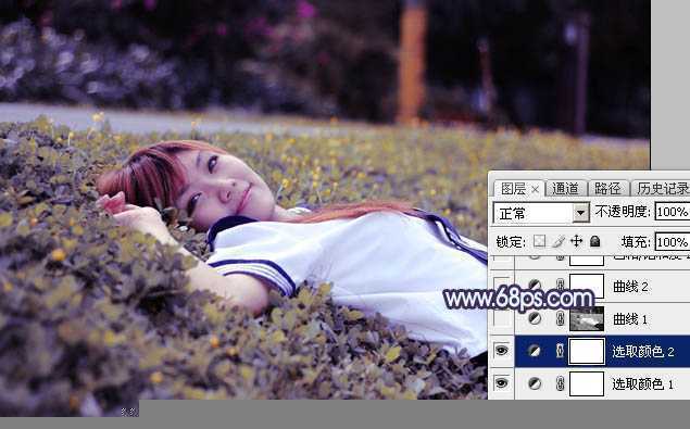 ‘Photoshop将草地人物图片调制出柔美的梦幻暗调蓝黄色‘