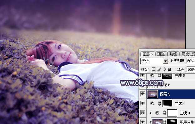‘Photoshop将草地人物图片调制出柔美的梦幻暗调蓝黄色‘