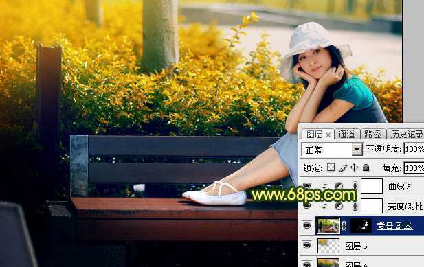 ‘Photoshop调制出暗调秋季黄褐色花坛边美女图片‘
