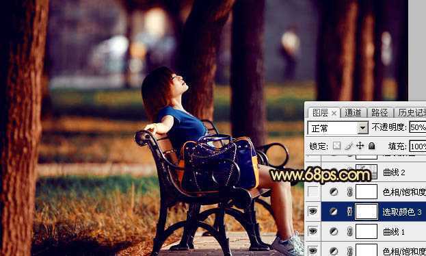 ‘Photoshop将公园中的人物加上暗调秋季暖色‘