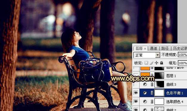 ‘Photoshop将公园中的人物加上暗调秋季暖色‘