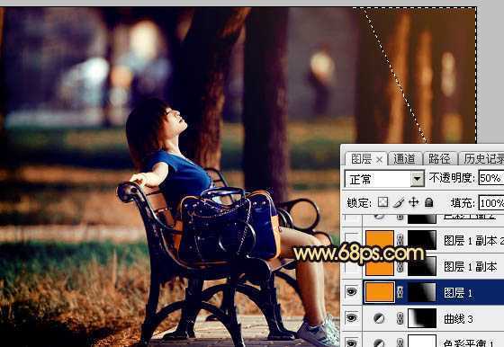 ‘Photoshop将公园中的人物加上暗调秋季暖色‘