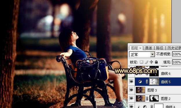 ‘Photoshop将公园中的人物加上暗调秋季暖色‘