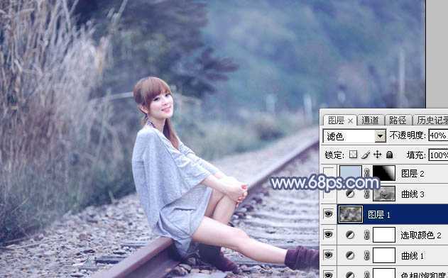 ‘Photoshop为铁轨上的美女加上梦幻甜美的蓝色效果‘