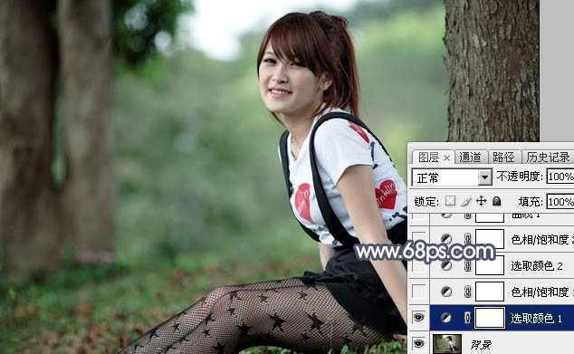 ‘Photoshop调出暗调蓝红色树林美女图片‘