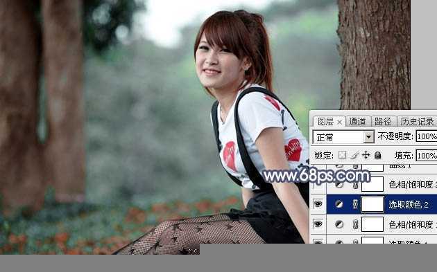 ‘Photoshop调出暗调蓝红色树林美女图片‘