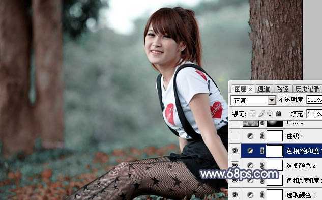 ‘Photoshop调出暗调蓝红色树林美女图片‘
