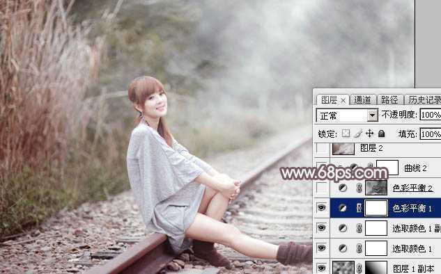 ‘Photoshop调制出唯美的中性淡粉蓝色铁轨美女图片‘