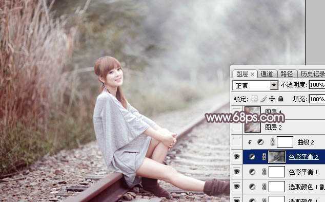 ‘Photoshop调制出唯美的中性淡粉蓝色铁轨美女图片‘
