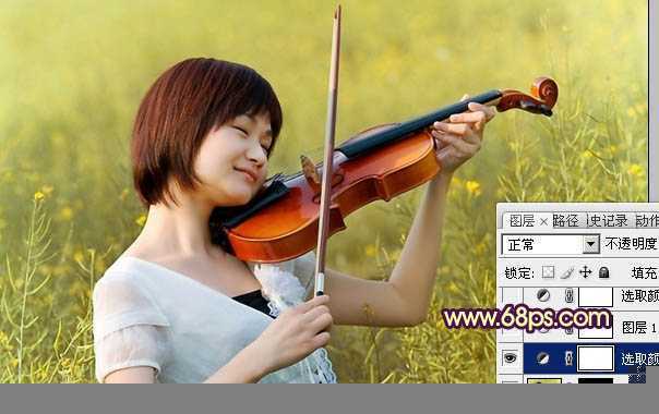 ‘Photoshop将油菜花美女图片跳出漂亮的橙黄色‘