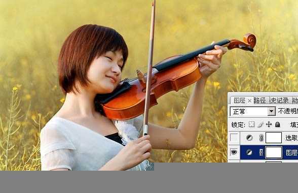 ‘Photoshop将油菜花美女图片跳出漂亮的橙黄色‘