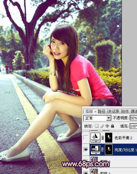 ‘Photoshop将公路人物图片调成灿烂的暖色调‘