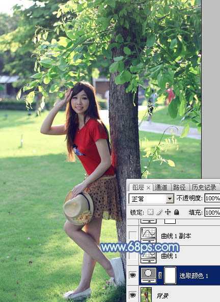 ‘Photoshop为树边的女孩增加流行的淡调青蓝色‘