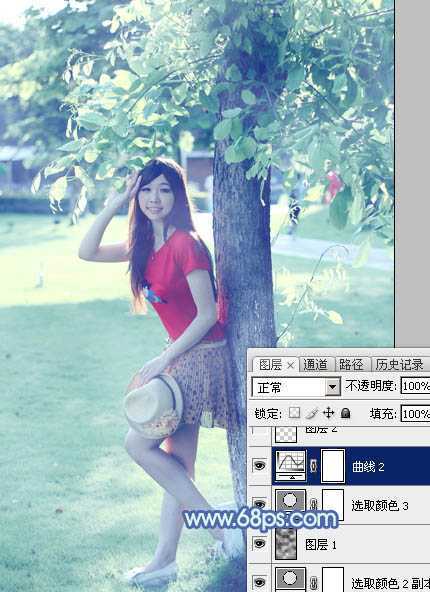 ‘Photoshop为树边的女孩增加流行的淡调青蓝色‘