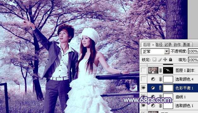 ‘Photoshop将树林婚片调制出梦幻的红紫色‘