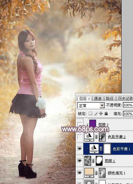 ‘Photoshop将树林中的美女调制出唯美的秋季蓝红色特效‘