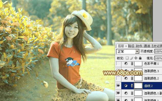‘Photoshop将花园中的人物图片调制出唯美的金色调‘