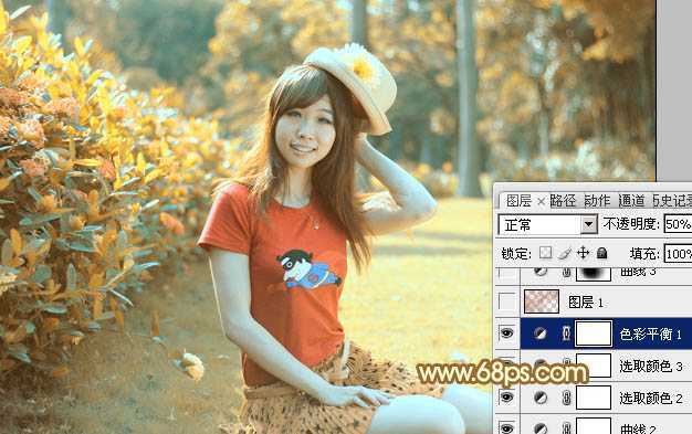 ‘Photoshop将花园中的人物图片调制出唯美的金色调‘