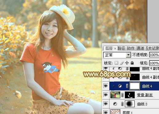 ‘Photoshop将花园中的人物图片调制出唯美的金色调‘