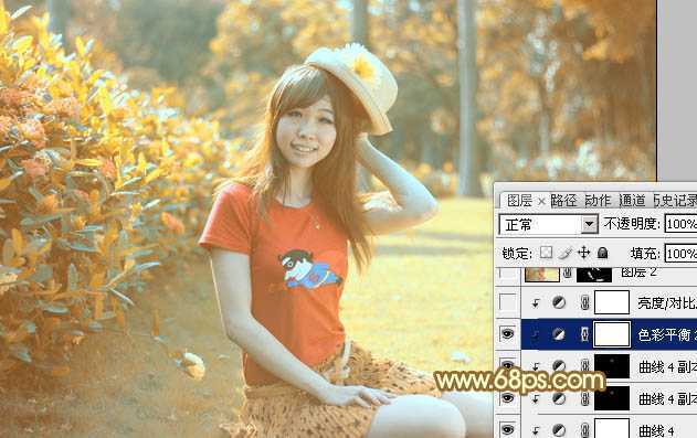 ‘Photoshop将花园中的人物图片调制出唯美的金色调‘