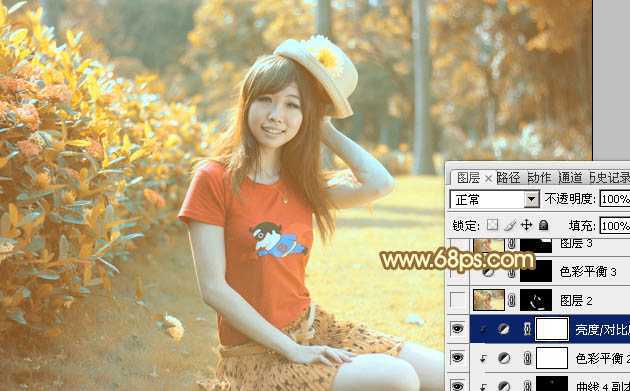 ‘Photoshop将花园中的人物图片调制出唯美的金色调‘