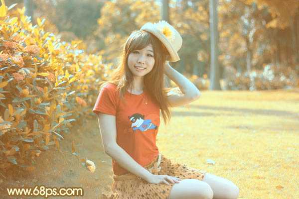 ‘Photoshop将花园中的人物图片调制出唯美的金色调‘