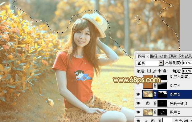‘Photoshop将花园中的人物图片调制出唯美的金色调‘
