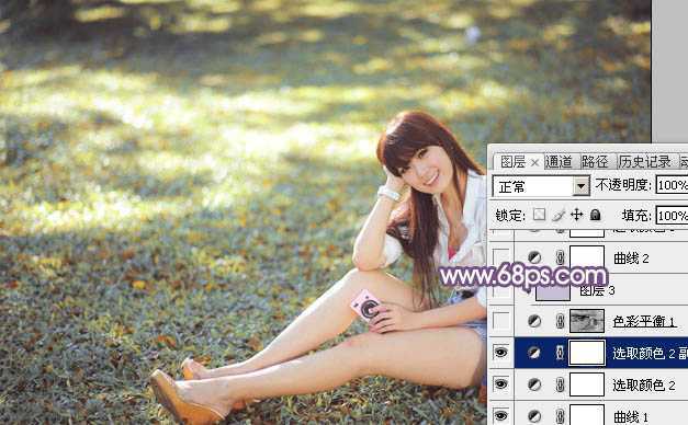 ‘Photoshop为草地上的美女调制明快的秋季蓝黄色‘