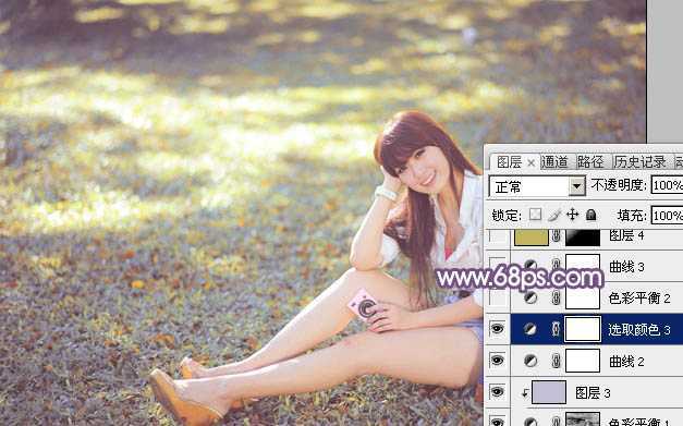 ‘Photoshop为草地上的美女调制明快的秋季蓝黄色‘