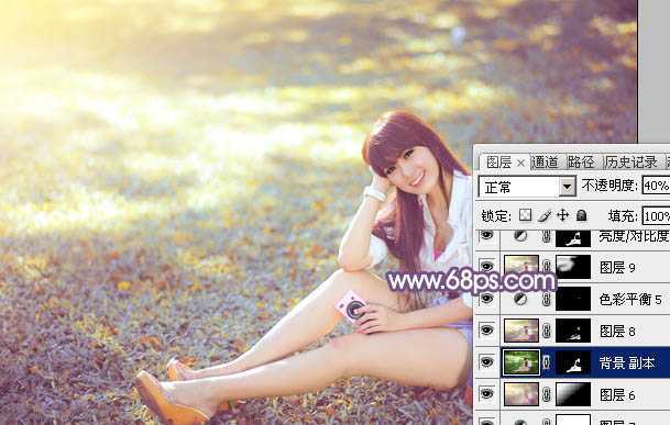 ‘Photoshop为草地上的美女调制明快的秋季蓝黄色‘