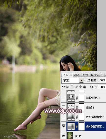 ‘Photoshop为湖边的美女加上淡淡的粉褐色‘