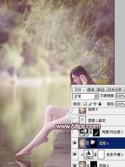 ‘Photoshop为湖边的美女加上淡淡的粉褐色‘