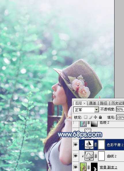 ‘Photoshop将树景美女图片打造唯美的小清新的淡调青绿色‘