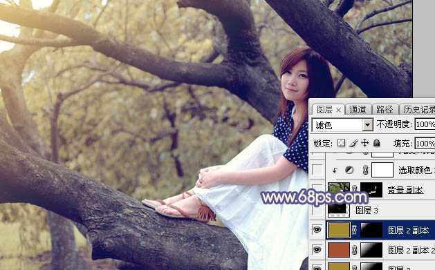 ‘Photoshop为大树上的美女加上秋季晨曦蓝黄色效果‘