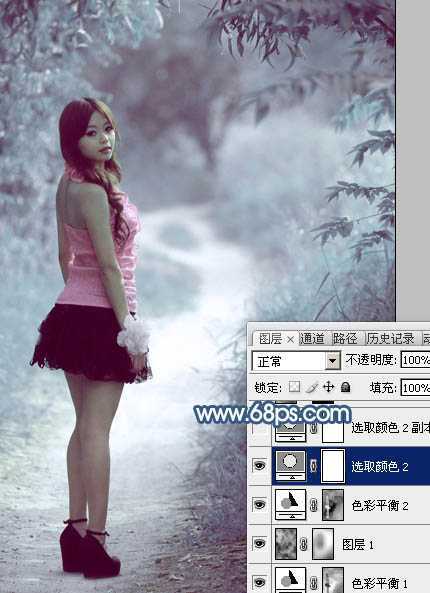 ‘Photoshop为树景美女图片打造梦幻的冷调青蓝色‘