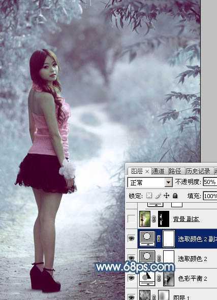 ‘Photoshop为树景美女图片打造梦幻的冷调青蓝色‘