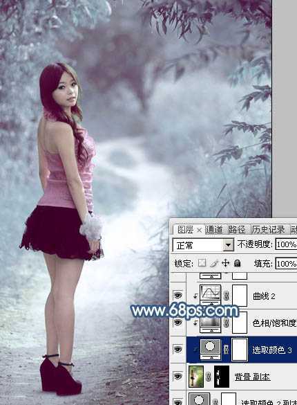 ‘Photoshop为树景美女图片打造梦幻的冷调青蓝色‘