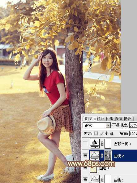 ‘photoshop快速为树下的人物调制出柔和的秋季黄褐色‘