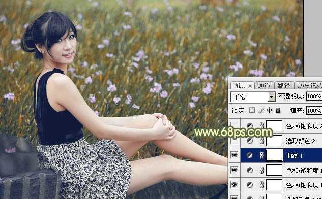 ‘Photoshop为草地上的美女加上古典暗调青黄色‘