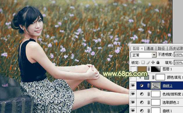 ‘Photoshop为草地上的美女加上古典暗调青黄色‘