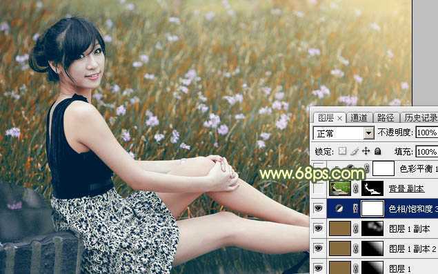 ‘Photoshop为草地上的美女加上古典暗调青黄色‘