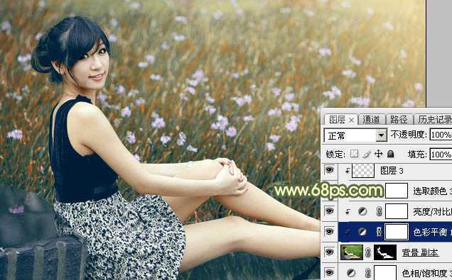 ‘Photoshop为草地上的美女加上古典暗调青黄色‘