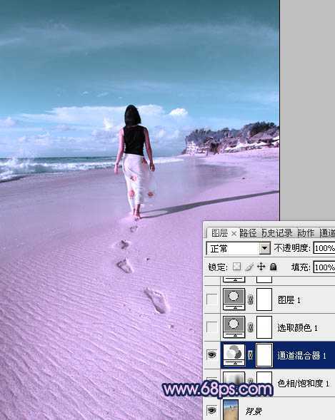‘Photoshop将沙滩人物图片调成漂亮的淡蓝色‘