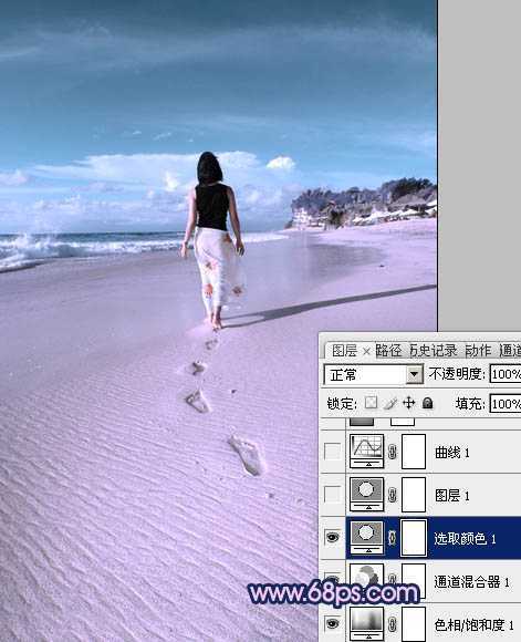 ‘Photoshop将沙滩人物图片调成漂亮的淡蓝色‘