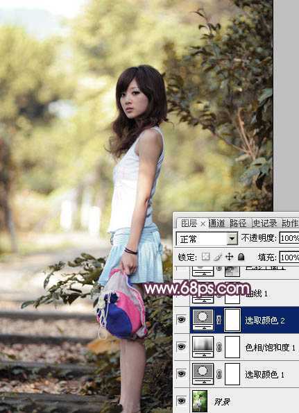 ‘Photoshop将美女树景图片打造柔美的暗调红褐色‘