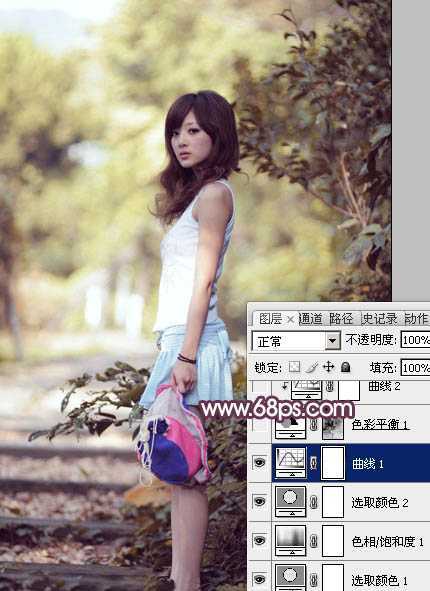 ‘Photoshop将美女树景图片打造柔美的暗调红褐色‘