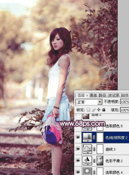 ‘Photoshop将美女树景图片打造柔美的暗调红褐色‘