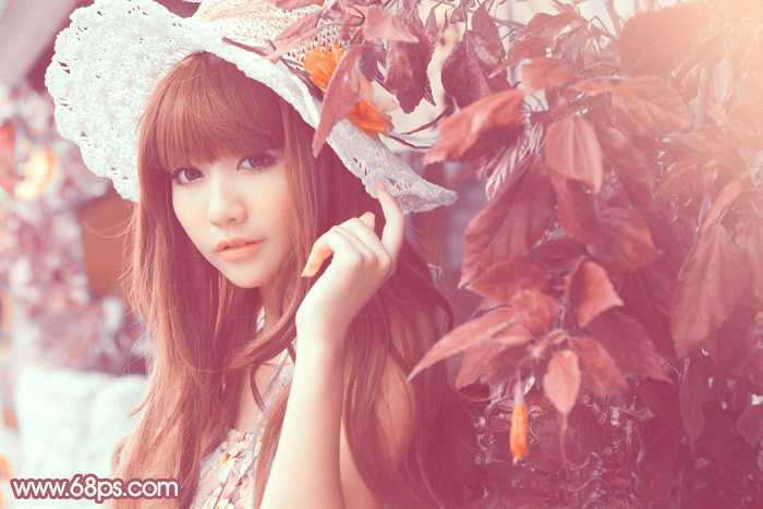 ‘Photoshop将树叶下的美女图片增加上甜美的橙色效果‘