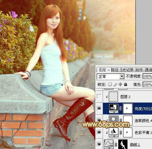 ‘Photoshop为花坛边美女调制出非常柔和的阳光暖色效果‘