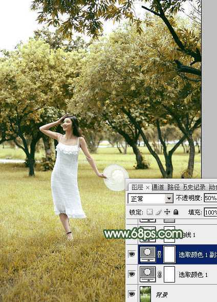 ‘Photoshop将树景人物图片打造灿烂的黄绿色‘
